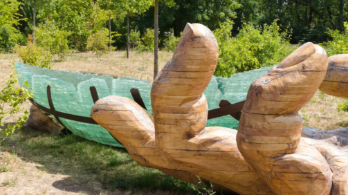 Huge,Wooden,Hand,Let,The,Glass,Boat,Go